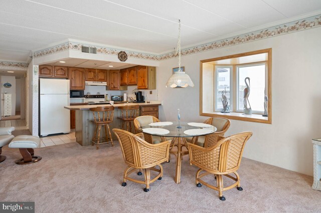 6109 Atlantic Ave Unit 201, Ocean City, MD 21842 - dining room featuring light colored carpet and crown molding