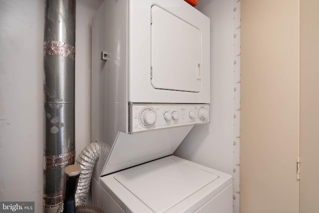 6109 Atlantic Ave Unit 201, Ocean City, MD 21842 - clothes washing area with stacked washer / dryer