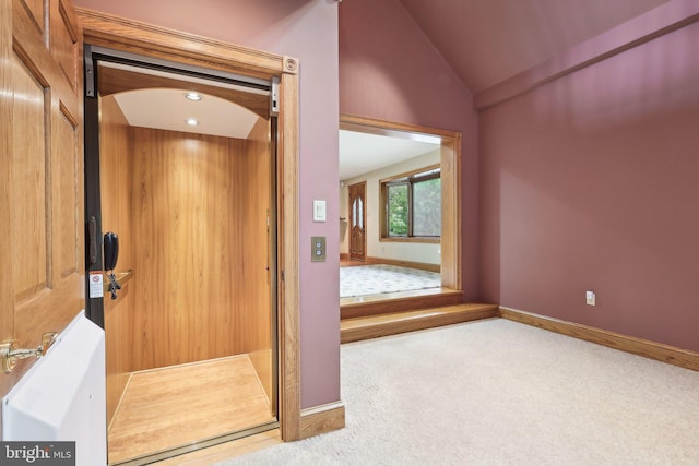 2619 New Falls Rd, Levittown, PA 19056 - interior space featuring elevator, carpet, vaulted ceiling, and baseboards