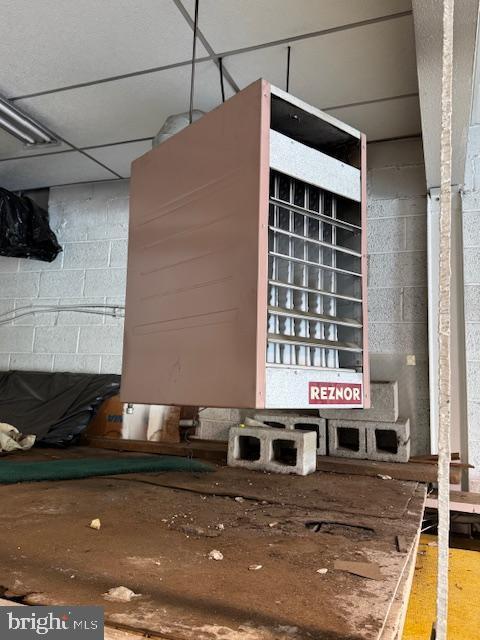 2619 New Falls Rd, Levittown, PA 19056 - detailed view of concrete block wall and a heating unit