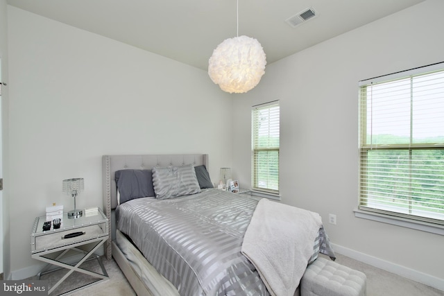10810 Norbourne Farm Rd, Upper Marlboro, MD 20772 - bedroom with baseboards, carpet, and a chandelier