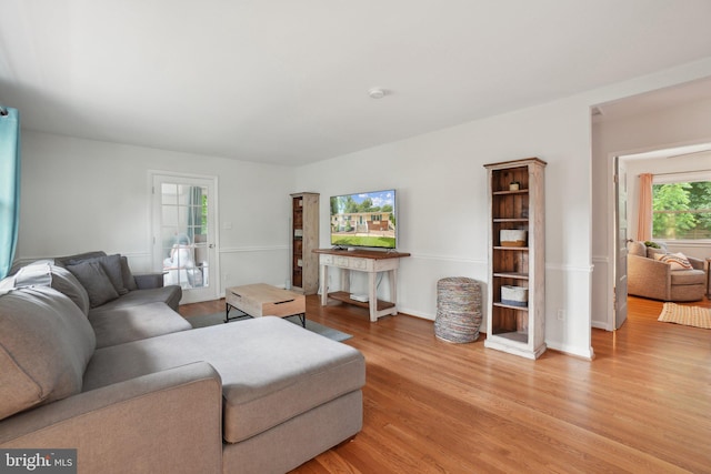 5728 Sunbury Dr, Alexandria, VA 22303 - living area featuring light wood-style flooring and baseboards