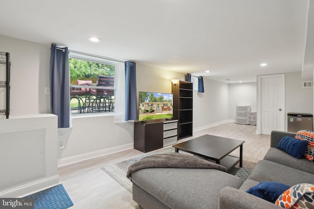 5728 Sunbury Dr, Alexandria, VA 22303 - living area with wood finished floors, baseboards, and recessed lighting