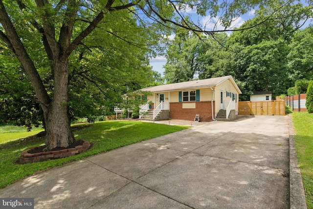 5728 Sunbury Dr, Alexandria, VA 22303 - single story home with driveway and brick siding