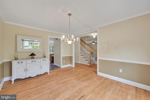 488 Seedling Ct, Mechanicsburg, PA 17055 - unfurnished dining area with light wood-type flooring, a chandelier, baseboards, ornamental molding, and ceiling fan