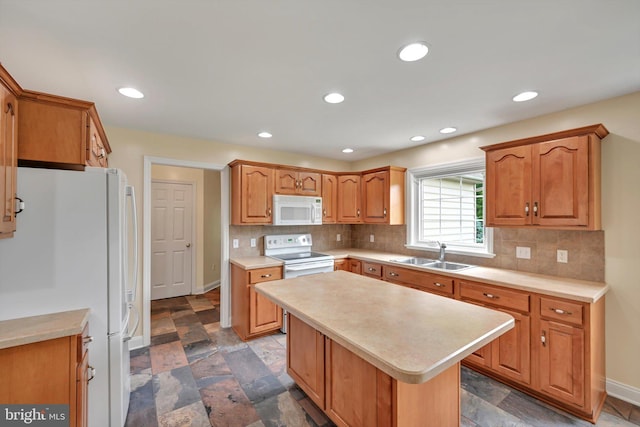 488 Seedling Ct, Mechanicsburg, PA 17055 - kitchen with white appliances, a sink, stone tile flooring, light countertops, and recessed lighting