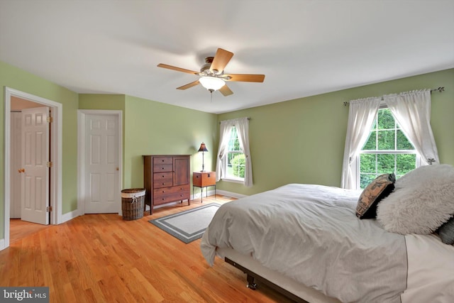 488 Seedling Ct, Mechanicsburg, PA 17055 - bedroom with light wood-style flooring, ceiling fan, and baseboards