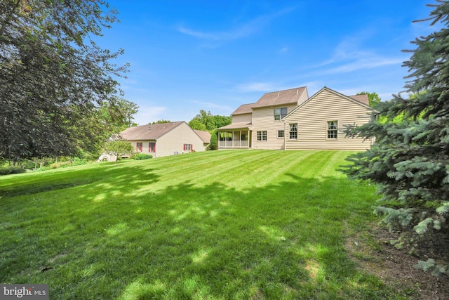 488 Seedling Ct, Mechanicsburg, PA 17055 - rear view of house featuring a yard and a sunroom