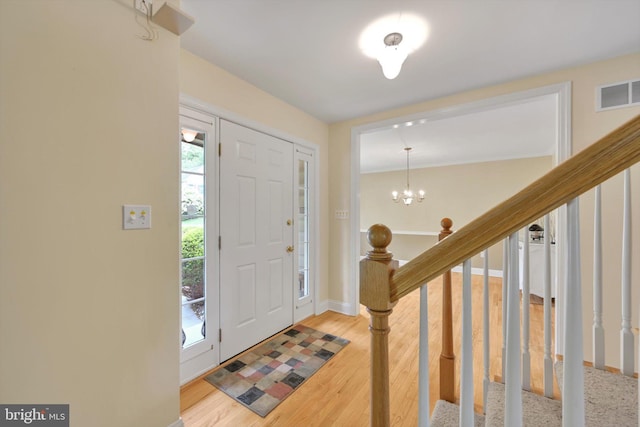 488 Seedling Ct, Mechanicsburg, PA 17055 - foyer entrance featuring baseboards, light wood-type flooring, and stairs