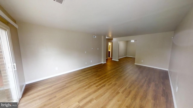 10239 Prince Pl Unit 26-T1, Upper Marlboro, MD 20774 - spare room with light wood-style flooring and baseboards