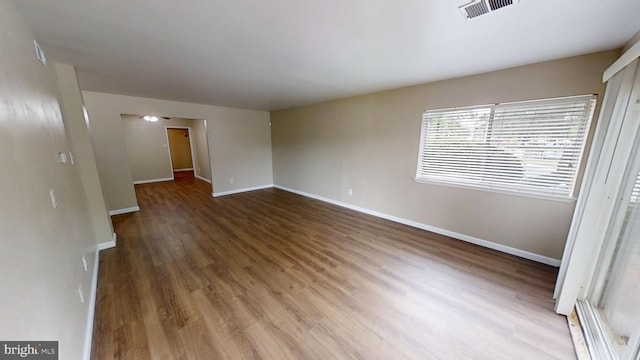 10239 Prince Pl Unit 26-T1, Upper Marlboro, MD 20774 - spare room featuring wood finished floors and baseboards
