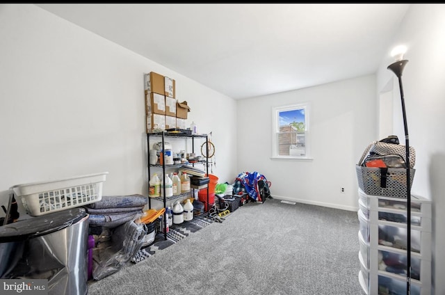 rec room with carpet flooring and baseboards