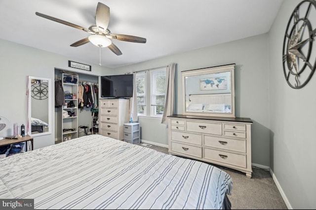 bedroom featuring baseboards, a closet, carpet floors, and a ceiling fan