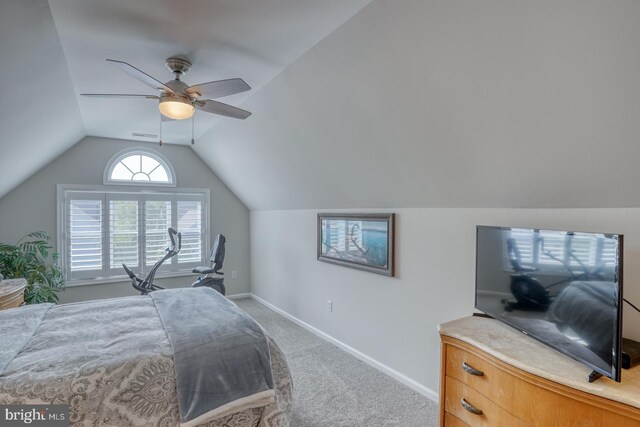 bedroom featuring carpet, lofted ceiling, ceiling fan, and baseboards
