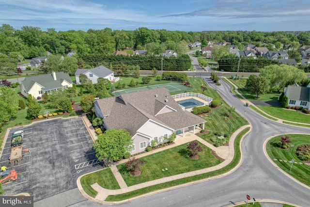 aerial overview of property's location with nearby suburban area