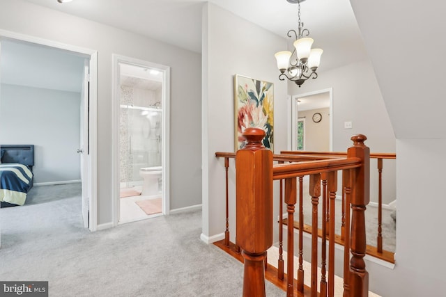 41 Fair Acres Ct, Princeton, NJ 08540 - hallway featuring an upstairs landing, a chandelier, carpet flooring, and baseboards