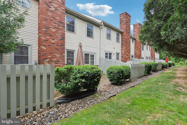 41 Fair Acres Ct, Princeton, NJ 08540 - rear view of house featuring fence and a chimney