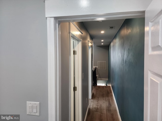 5335 W Girard Ave, Philadelphia, PA 19131 - hall featuring dark wood-style flooring, recessed lighting, baseboards, and an upstairs landing