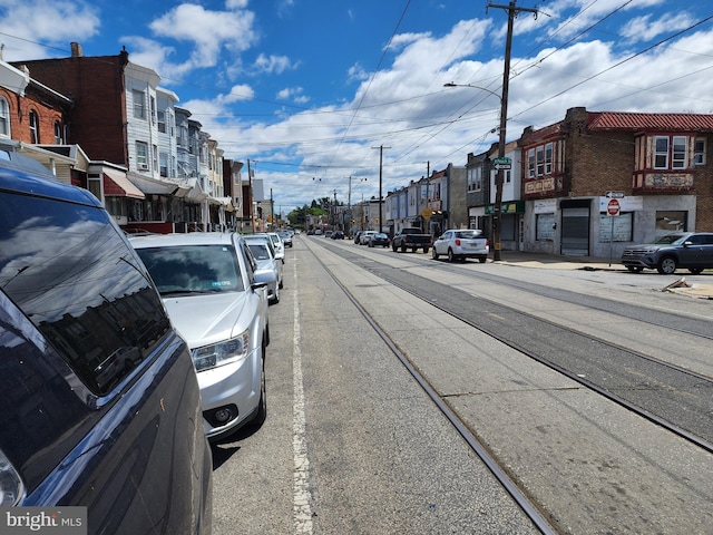 5335 W Girard Ave, Philadelphia, PA 19131 - view of asphalt road featuring street lighting, a residential view, and sidewalks