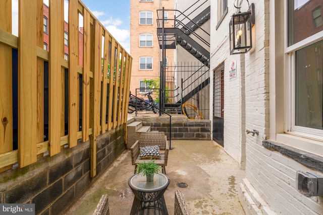 view of patio featuring stairway