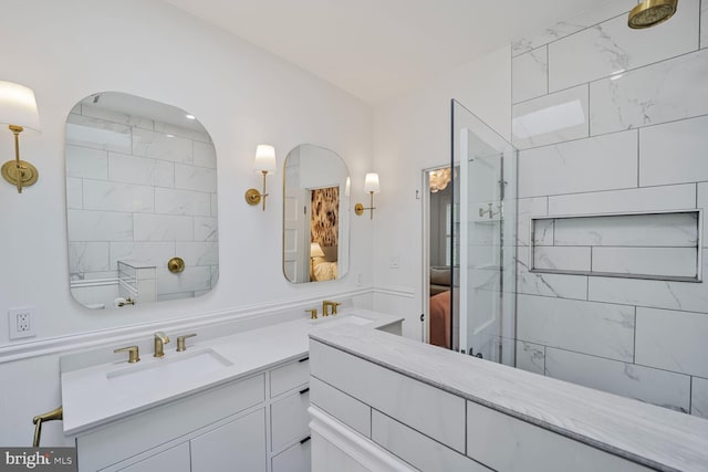 ensuite bathroom with tiled shower and vanity