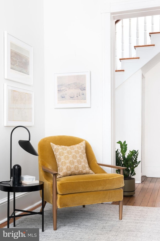 sitting room with wood finished floors