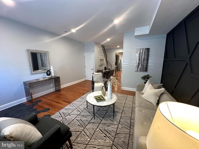 3133 Richmond St, Philadelphia, PA 19134 - living room featuring wood finished floors, baseboards, stairs, and recessed lighting