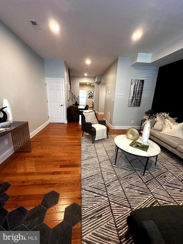 3133 Richmond St, Philadelphia, PA 19134 - living room featuring wood finished floors, stairway, baseboards, and recessed lighting