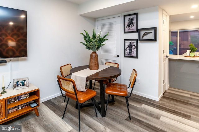 23 Eden Roc, New Hope, PA 18938 - dining area with wood finished floors, baseboards, and recessed lighting