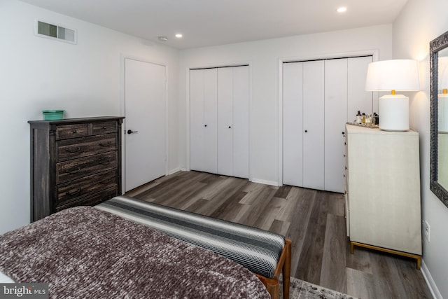 23 Eden Roc, New Hope, PA 18938 - bedroom featuring wood finished floors, two closets, and recessed lighting