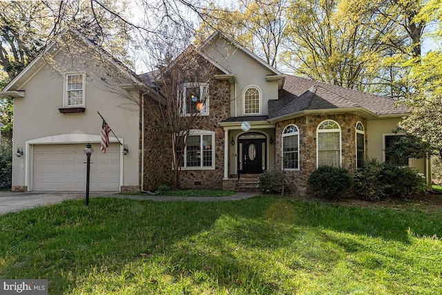 14535 Honeysuckle, Issue, MD 20645 - traditional-style house featuring a garage, a front lawn, concrete driveway, stucco siding, and stone siding