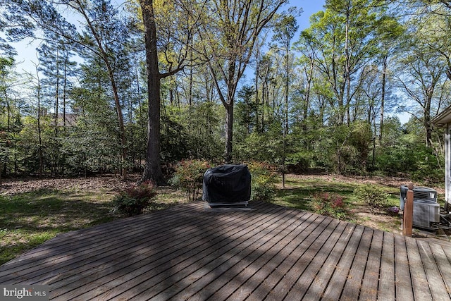 14535 Honeysuckle, Issue, MD 20645 - wooden deck featuring central AC unit and grilling area