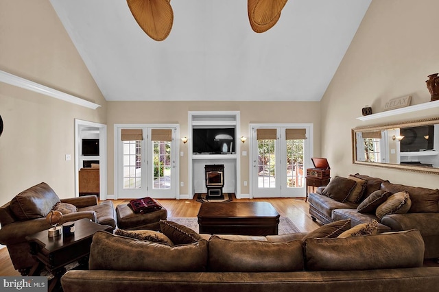 14535 Honeysuckle, Issue, MD 20645 - living room featuring high vaulted ceiling, french doors, wood finished floors, and plenty of natural light