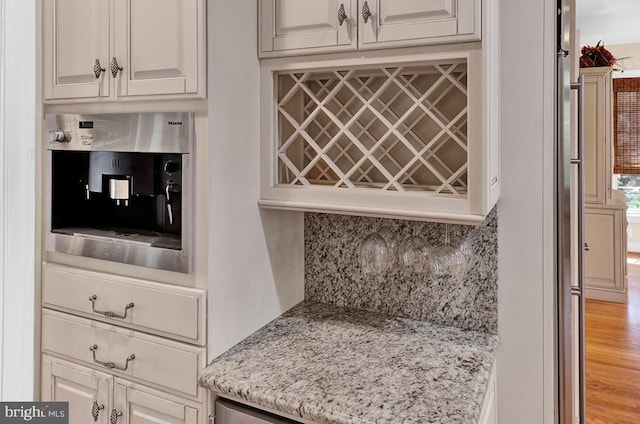 14535 Honeysuckle, Issue, MD 20645 - bar area featuring backsplash and light wood-style flooring