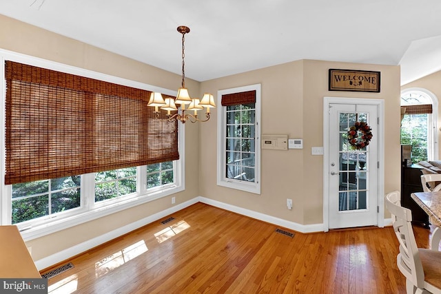 14535 Honeysuckle, Issue, MD 20645 - foyer entrance with baseboards, a chandelier, and plenty of natural light