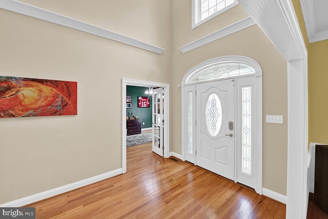 14535 Honeysuckle, Issue, MD 20645 - foyer with light wood-style floors, baseboards, and a high ceiling