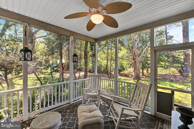 14535 Honeysuckle, Issue, MD 20645 - sunroom featuring a ceiling fan and view of scattered trees