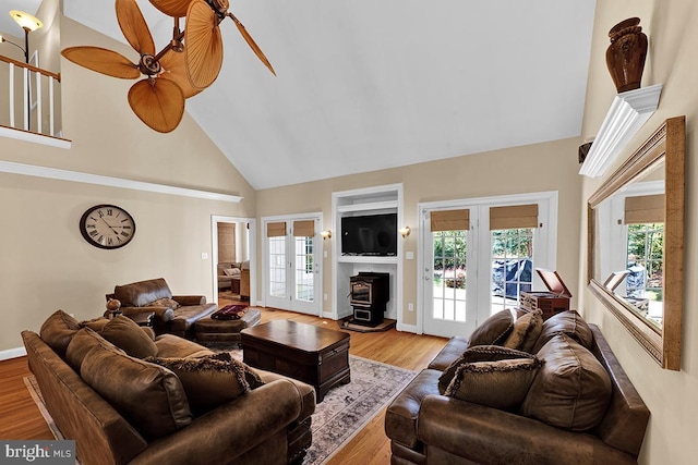 14535 Honeysuckle, Issue, MD 20645 - living room with french doors, high vaulted ceiling, plenty of natural light, ceiling fan, and wood finished floors