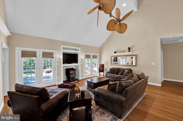14535 Honeysuckle, Issue, MD 20645 - living room featuring high vaulted ceiling, ceiling fan, french doors, wood finished floors, and baseboards