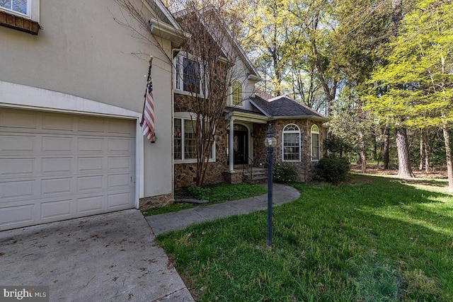 14535 Honeysuckle, Issue, MD 20645 - view of front of home featuring stone siding, a front yard, and concrete driveway