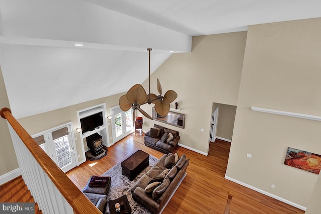 14535 Honeysuckle, Issue, MD 20645 - living room with baseboards, high vaulted ceiling, wood finished floors, and beam ceiling