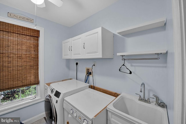 14535 Honeysuckle, Issue, MD 20645 - clothes washing area with washing machine and clothes dryer, cabinet space, baseboards, and ceiling fan