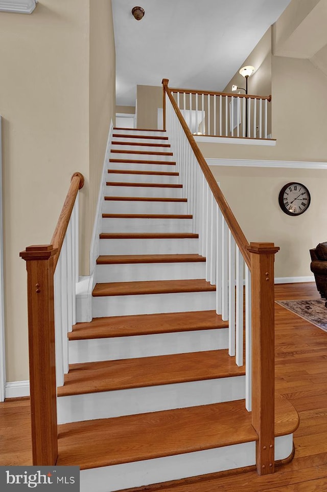 14535 Honeysuckle, Issue, MD 20645 - staircase featuring wood finished floors and baseboards