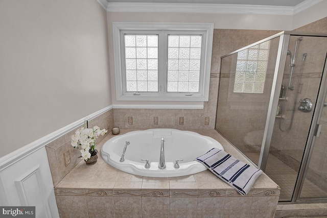 14535 Honeysuckle, Issue, MD 20645 - bathroom with a bath, a stall shower, crown molding, and wainscoting