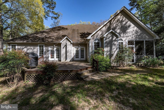 14535 Honeysuckle, Issue, MD 20645 - back of property with french doors, a deck, and a sunroom