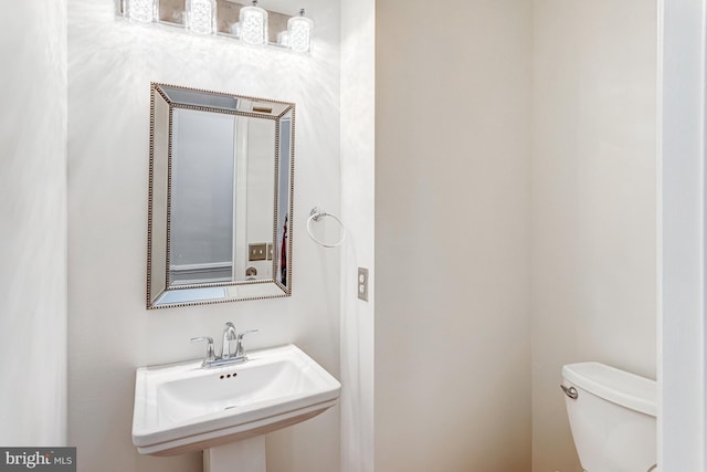 16453 Sparkling Brook Loop, Dumfries, VA 22025 - bathroom with a sink and toilet