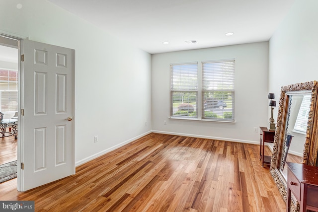 16453 Sparkling Brook Loop, Dumfries, VA 22025 - spare room with healthy amount of natural light and light wood-style flooring