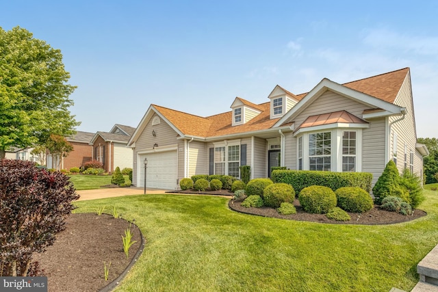 16453 Sparkling Brook Loop, Dumfries, VA 22025 - view of front of house featuring a front yard, a garage, driveway, and roof with shingles