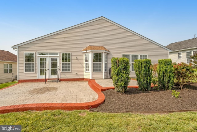 16453 Sparkling Brook Loop, Dumfries, VA 22025 - rear view of house with a patio area