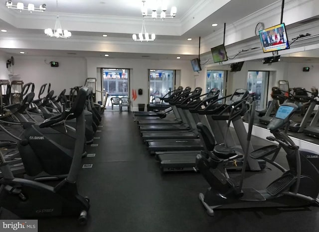 16453 Sparkling Brook Loop, Dumfries, VA 22025 - exercise room with ornamental molding, a tray ceiling, recessed lighting, and a chandelier